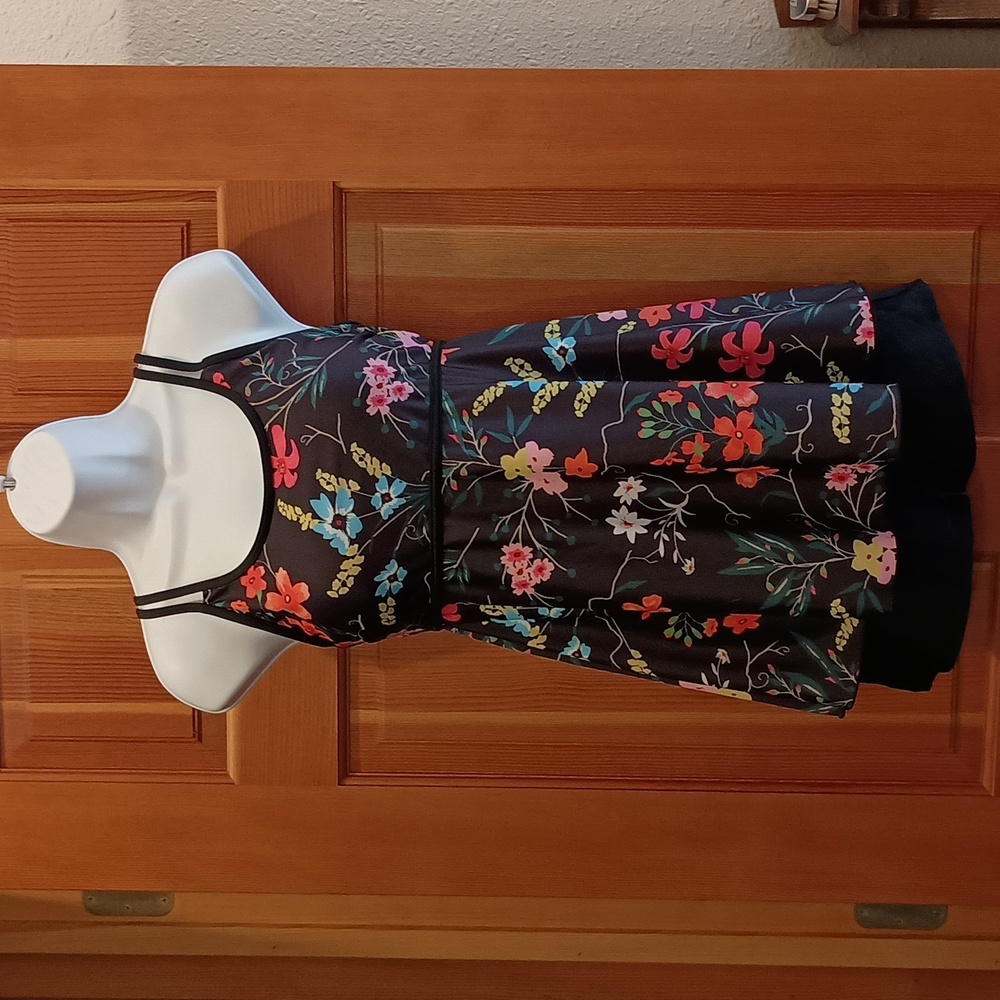Swimdress. NWOT. Never worn, black, tropical, with black shorts.